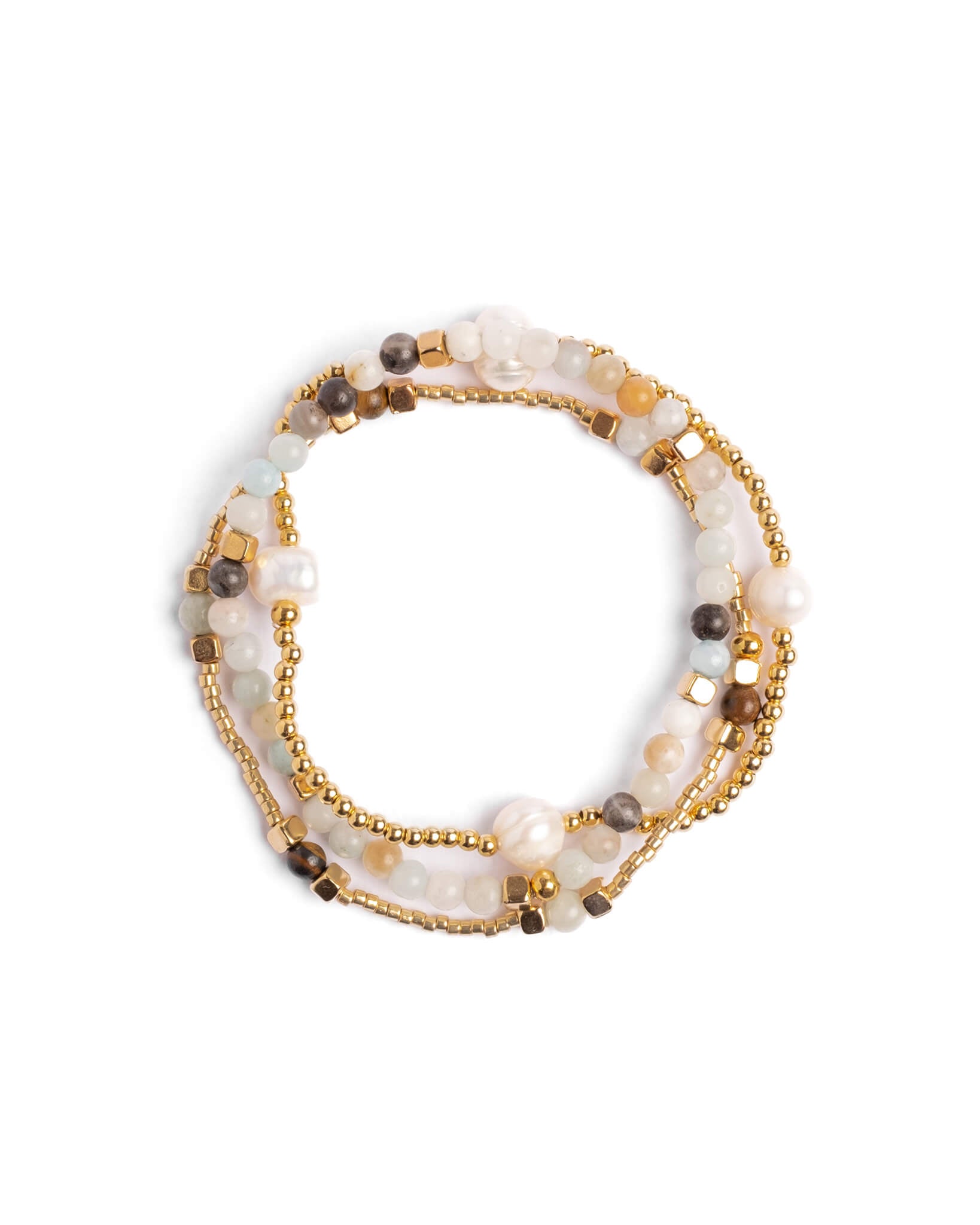 Stack of beaded bracelets with gold accents on a white background