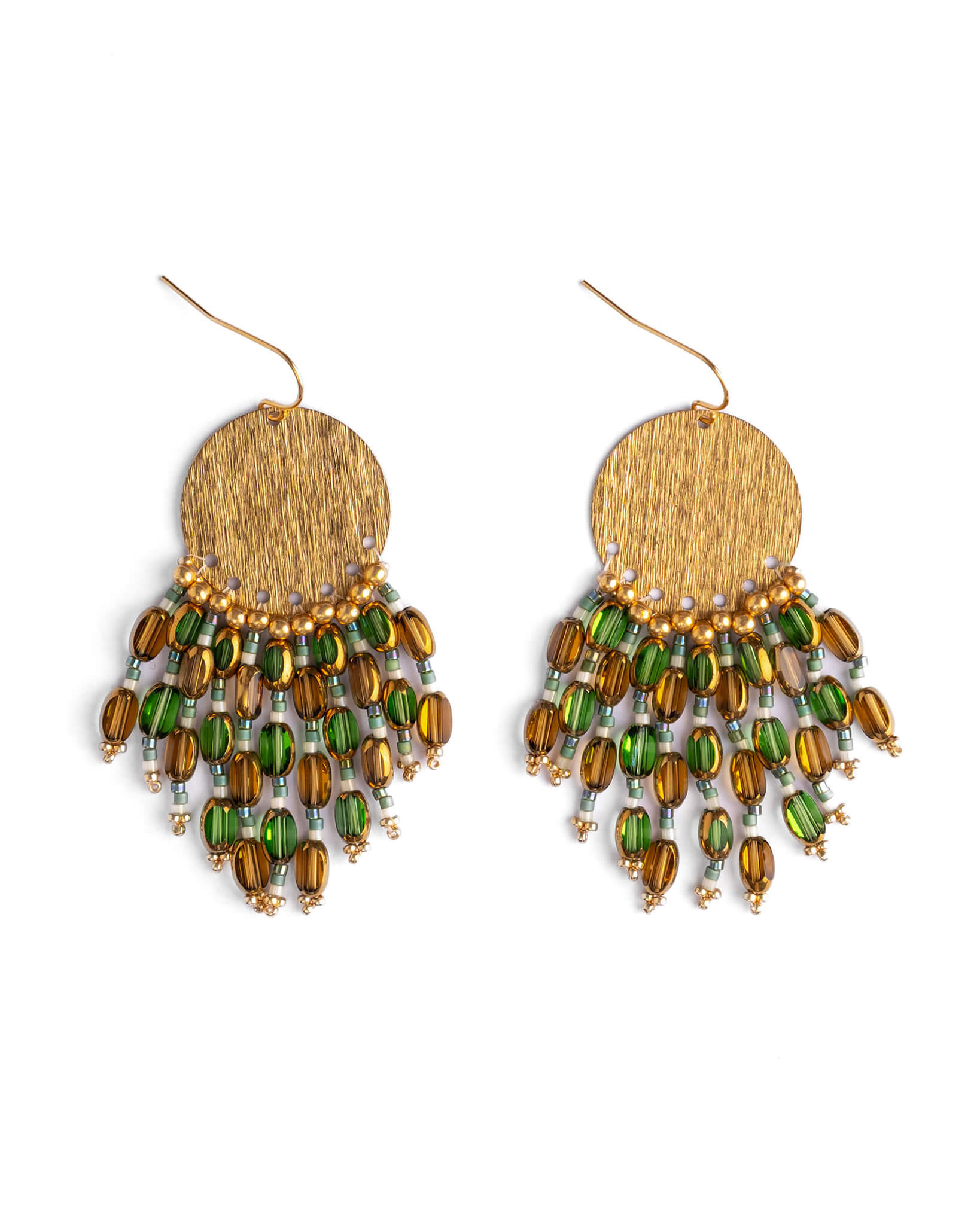 Gold and green beaded earrings on a white background