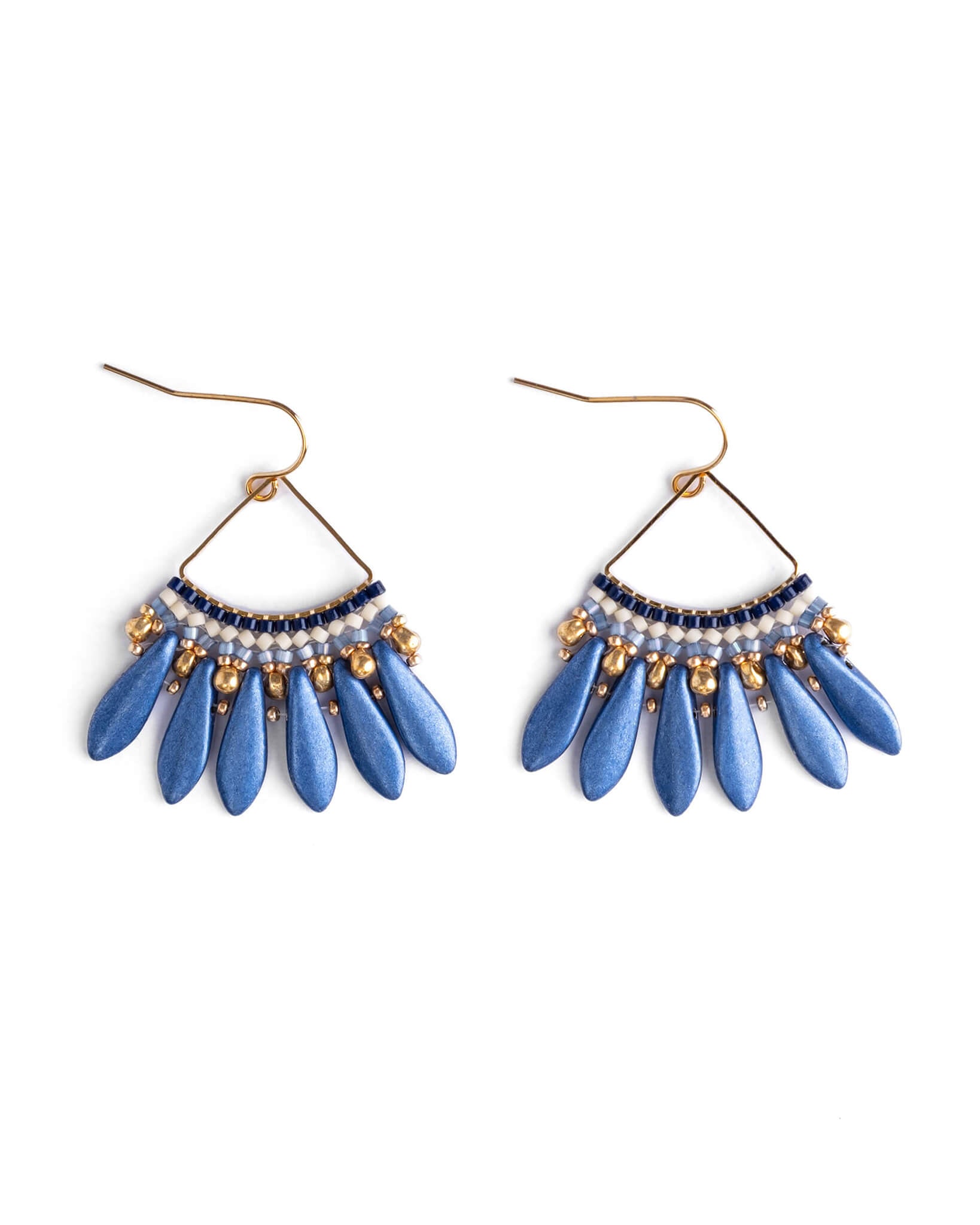 Blue beaded earrings with gold accents on a white background